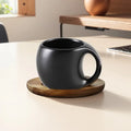 Schwarze Tasse + Untertasse
