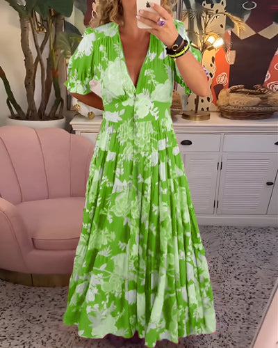 CATERINA | Langes Blumen midi Kleid mit versteckten Taschen und femininem Taglio für den Tag