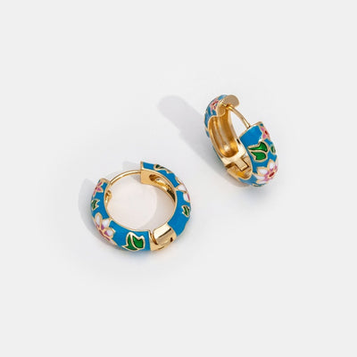 Goldene Kreolen mit Blume